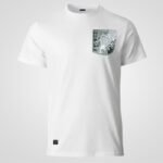 Camiseta blanca de algodón orgánico faaia con un bolsillo de tela fallera en tonos verdes