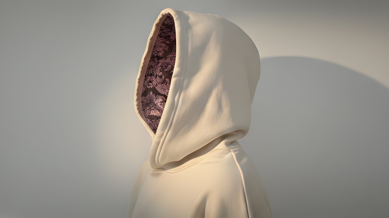 Sudadera de perfil con la capucha abierta con forro interior en tela damasco marrón con ornamentación rosa.