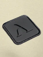 Zoom de parche de micro inyeccion marca Faaia con relieve en el icono