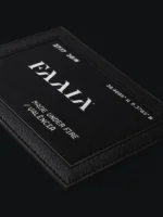 Imagen zoom de parche textil d color negro con el logo de faaia en blanco.