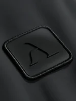 Etiqueta de micro inyección para textil con el icono de faaia en relieve.