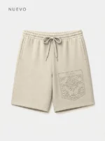 Pantalón corto color tierra marca Faaia con un bordado tono sobre tono.