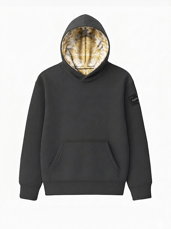 sudadera-color-ebony-con-damasco-blanco-oro-en-capucha-faaia Vista frontal sudadera color gris ebony con la capucha forrada con un damasco blanco con hilo oro tejido en telar valenciano.
